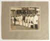 The Ashes. England v Australia 1934. &lsquo;Verity&rsquo;s Match&rsquo;. Two large mounted photographs from the match. The first shows the England team being introduced to Hedley Verity and the team on the pitch prior to the start of the match, the second features the mass