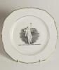Hedley Verity, Yorkshire & England. Unusual commemorative ceramic plate for &lsquo;Hedley Verity, England&rsquo;s Famous Spin Bowler&rsquo; with transfer printed vignette of Verity in bowling pose and title to face. Gold lustre to inner and outer rim. To verso, a transfer 