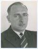 Hedley Verity. Yorkshire & England 1930-1939. Excellent mono press photograph of Verity, head and shoulders, wearing suit and tie. Very nicely signed in ink by Verity to image. The photograph by &lsquo;Photo Fischer. Parliament Chambers C.T.&rsquo; to verso. 6.5&rdquo;x8.5