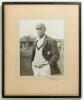 Wilfred Rhodes. Yorkshire & England 1898-1930. Excellent large original mono photograph of Rhodes, three quarter length, wearing cricket attire and his Yorkshire cap and blazer at a cricket ground. Very nicely signed &lsquo;Yours sincerely W. Rhodes&rsquo; to lower e