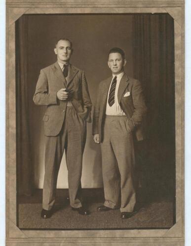 Hedley Verity, Yorkshire & England, 1930-39 and Maurice Leyland, Yorkshire & England 1920-1947. Excellent sepia studio portrait photograph of the two players, full length, wearing suits and ties, Verity holding a pipe in his right hand. The photograph, ta