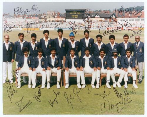 India tour to England 1990. Sachin Tendulkar&rsquo;s first overseas tour. Official colour photograph of the Indian touring party seated and standing in rows wearing tour blazers. The photograph signed in ink by eighteen members of the touring party. Players&rsquo; si