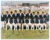 India tour to England 1990. Sachin Tendulkar&rsquo;s first overseas tour. Official colour photograph of the Indian touring party seated and standing in rows wearing tour blazers. The photograph signed in ink by eighteen members of the touring party. Players&rsquo; si