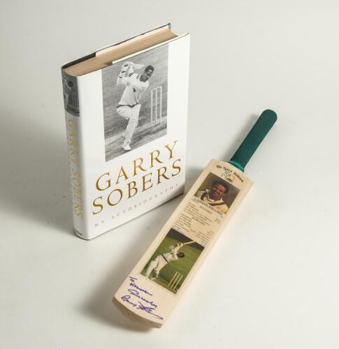 Norman Gifford. Worcestershire, Warwickshire & England 1960-83. &lsquo;Garry Sobers- My Autobiography&rsquo;. G. Sobers. London 2002. Nicely signed and dedicated to Gifford by Sobers to title page and a miniature cricket bat which records Garry Sobers career details 
