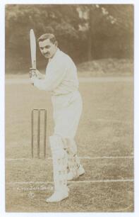 Kumar Shri Ranjitsinhji. Cambridge University, Sussex, London County & England 1893-1920. Early sepia real photograph postcard of Ranji standing full length in batting pose at the wicket. Printed title &lsquo;H.H. The Jam Sahib&rsquo; with diamond &lsquo;F&rsquo; logo for Foster