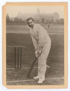 Kumar Shri Ranjitsinhji. Cambridge University, Sussex, London County & England, 1893-1920. Large original sepia photograph of Ranji at the wicket in batting pose looking directly at the camera. The photograph measures 7.75&rdquo;x10.75&rdquo;, laid to photographer&rsquo;s 