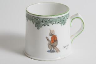 &lsquo;Next Man In&rsquo;. A small Royal Doulton Black Boy mug or tankard, entitled &lsquo;Next Man In&rsquo; printed, to one side, with a boy cricketer in red shirt, grey trousers and a floppy hat, sitting on his bat, waiting to go in, to verso, the crest &lsquo;The All Black Team&rsquo;. 