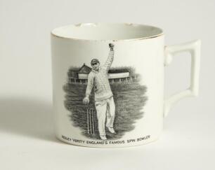 Hedley Verity. Yorkshire & England, 1930-39. W. Ellis of Bramley commemorative mug for &lsquo;Hedley Verity, England&rsquo;s Famous Spin Bowler&rsquo; with vignette of Verity in bowling pose. Verity&rsquo;s &lsquo;England and Australian Test Records&rsquo; to verso, ten wickets v Warwickshi