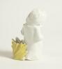 &lsquo;The Boss&rsquo;. Kinsella porcelain caricature spill vase of a young boy dressed as an Umpire in white coat wearing a white floppy hat. Printed title below spill vase. &lsquo;Copyright 482317&rsquo; to base. German, circa early 1900&rsquo;s. Approximately 5.5&rdquo; tall. Damage with - 2