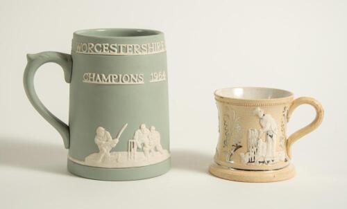 Cricket mugs/tankards. Small Staffordshire 3&rdquo; waisted cricket mug with strap handle and beaded rim, with cream background and three raised figures in white of a batsman, bowler and wicket keeper, believed to be Lillywhite, Pilch and Box. c1870. Silver lus