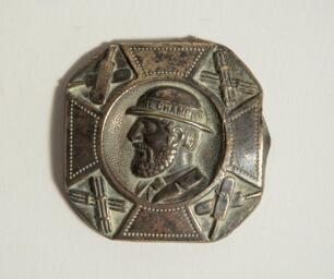 &lsquo;The Champion&rsquo;. Early brass cricket belt buckle of square form with rounded corner with head and shoulders image of a bearded cricketer wearing a bowler style hat with the legend &lsquo;The Champion&rsquo; to the hat band. The image of the cricketer at the centre of 