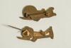 Robertson Golden Shred. Two metal golly cricketing lapel pin badges, each with maker&rsquo;s name to verso for Fattorini of Birmingham. 1.5&rdquo; tall. Sold with a similar paper golly label, 2&rdquo; tall. Good condition. Qty 3. - 2