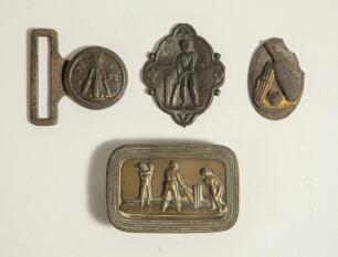 &lsquo;Cricketers at Play&rsquo;. Oblong shaped brass belt buckle with scene of a bowler bowling to a batsman with wicket-keeper behind the stumps, circa 1860/70&rsquo;s. Decorative border. Approximately 2.75&rdquo;x1.75&rdquo;. Good condition. Sold with a further small brass clasp d