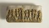 Cricket belt buckle. A larger oblong shaped belt buckle in silver metal over mounted with a brass plate featuring a cricket team of eleven players with bats, balls and wickets, one fielder is throwing the ball in the air. Circa 1870. Approximately 3.5&rdquo;x1.