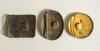 Cricket belt buckles. Three simple brass belt buckles decorated with crossed bats, ball and stumps to one, a batsman posed at the wicket with bat and ball and a further batsman leaning on his bat. One oblong 2.25&rdquo;x1.75&rdquo;, one circular, 2&rdquo; diameter and one - 2