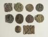 Cricket belt buckles. A selection of buckles, all with faults, and some metal band brass motifs used to decorate and enhance belt buckles. The buckles include a circular buckle with batsman at the wicket, a batsman with bat under his arm, a batsman playin