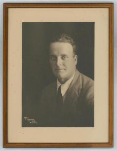 Roy Kilner. Yorkshire, Europeans & England 1911-1927. Excellent mono studio portrait photograph of a Kilner, head and shoulders wearing a suit and tie. The photograph, by May Moore of Sydney, measures 5.25&rdquo;x7.5&rdquo;, laid to slightly larger photographer&rsquo;s mou