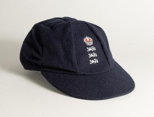 Andrew Richard Caddick. Somerset & England 1991-2009. England navy blue cloth Test cap, by Albion C&D of Australia, with embroidered three lions and coronet emblem of England to cap, worn by Caddick in the England v Australia &lsquo;Ashes&rsquo; series played in Engl