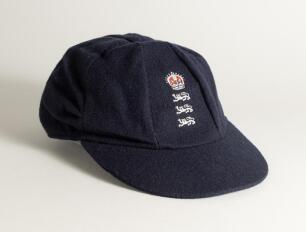Andrew Richard Caddick. Somerset & England 1991-2009. England navy blue cloth Test cap, by Albion C&D of Australia, with embroidered three lions and coronet emblem of England to cap, worn by Caddick in the England v Australia &lsquo;Ashes&rsquo; series played in Engl