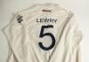 Jason Lewry. Sussex 1994-2009. Sussex white first XI cricket shirt worn by Lewry during the Sussex Championship winning season of 2006. The shirt with &lsquo;Sussex&rsquo;, martlets emblem and &lsquo;PAV I.T.&rsquo; sponsor&rsquo;s logo to front and collars. Sponsor &lsquo;Liverpool Victori - 2