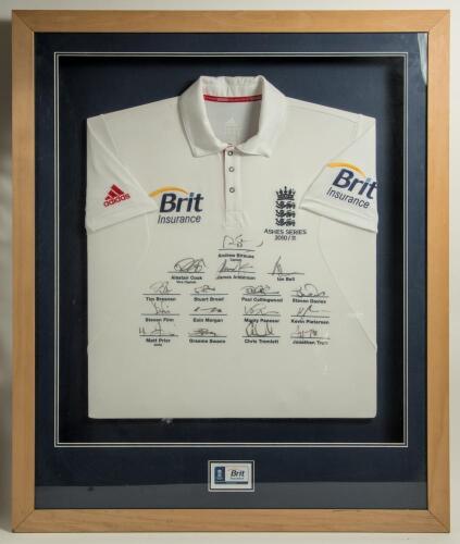 England tour to Australia 2010/11. England short sleeve white shirt with three lions and crown emblem to chest with &lsquo;Ashes Series 2010/11&rsquo; below, and sponsor &lsquo;Brit Insurance&rsquo; logo to chest and sponsor &lsquo;Adidas&rsquo; and &lsquo;Brit Insurance&rsquo; to sleeves. The shirt fu