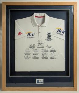 England tour to Australia 2010/11. England short sleeve white shirt with three lions and crown emblem to chest with &lsquo;Ashes Series 2010/11&rsquo; below, and sponsor &lsquo;Brit Insurance&rsquo; logo to chest and sponsor &lsquo;Adidas&rsquo; and &lsquo;Brit Insurance&rsquo; to sleeves. The shirt fu