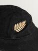 Harry Butler Cave. Wellington, Central Districts and New Zealand 1945 to 1959. New Zealand black cloth Test cap, by Ballantyres of Timaru, Wellington, with embroidered &lsquo;silver fern&rsquo; emblem of New Zealand to cap. Name to label &lsquo;H.B. Cave&rsquo;. Some wear to the - 2