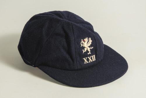 Peter William Denning. Somerset 1969-1984. Somerset 2nd XI cap worn by Denning during his playing career with Somerset. The navy blue cap, by Foster of London, with the Somerset emblem of a wyvern/dragon embroidered in white and a touch of red to the fron