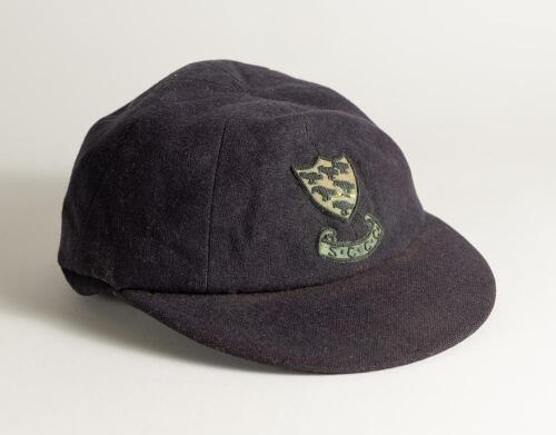 Reverend David Stuart Sheppard. Cambridge University, Sussex & England 1950-1964. Sussex navy blue 1st XI cloth cricket cap worn by Sheppard during his playing career. The cap, by W.V. Brown of Eton, embroidered with the six martlet&rsquo;s emblem of Sussex to 