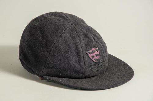 George Hubert Graham Doggart. Cambridge University, Sussex & England 1948-1961. Sussex navy blue 1st XI cloth cricket cap worn by Doggart during his playing career. The cap, by Foster of London, embroidered with the six martlet&rsquo;s emblem of Sussex to front