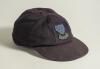 Colin Wells. Sussex 1979-1993. Sussex navy blue 1st XI cloth cricket cap worn by Wells during his playing career. The cap embroidered with the six martlet&rsquo;s emblem of Sussex to front. &lsquo;Bomber&rsquo; handwritten to inner label. Previously sold by Knights to the 