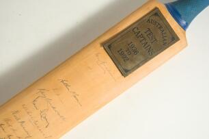 &lsquo;Australian Test Captains 1936 to 1992&rsquo;. Full size cricket bat with printed heading to top and players printed names running down the back of the bat from Don Bradman down to Allan Border. The bat signed by Bradman, Hassett, Morris, Johnson, Lindwall, Cra