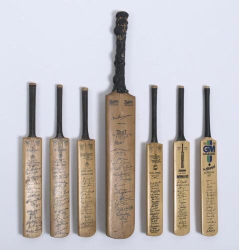 Miniature tour bats and ties. A Sykes of Norbury &lsquo;Don Bradman&rsquo; miniature bat with facsimile signatures of the West Indies touring party to India 1948/49. 17.25&rdquo;. Perishing to bat handle, otherwise in good condition. Also six miniature bats with facsimile 