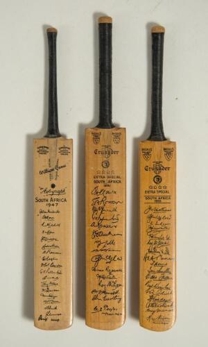 South Africa tours to England 1947-1955. Three miniature cricket bats with printed signatures of South African touring teams to England. Includes a Gunn & Moore &lsquo;Autograph&rsquo; bat for the 1947 tour, and two Gray Nicholls &lsquo;Crusader&rsquo; bats for the 1951 and 1955