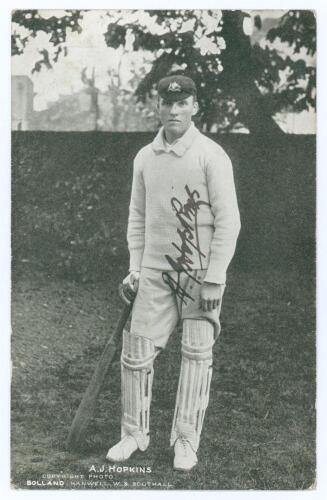 Albert John Young Hopkins. New South Wales & Australia 1896-1915. Early original mono postcard of Hopkins standing full length wearing cricket attire, Australia Test cap and leaning on his bat. Very nicely signed in black ink by Hopkins to the image. Prin