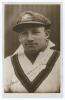 Donald George Bradman. New South Wales, South Australia & Australia 1927-1949. Excellent plain back sepia real photograph postcard of Bradman, head and shoulders, wearing Australian touring cap and sweater. The postcard very nicely signed by Bradman in in