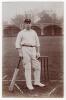 Clement &lsquo;Clem&rsquo; Hill. South Australia & Australia 1892-1925. Sepia real photograph postcard of Hill standing full length at the wicket, leaning on his bat, wearing Australia tour cap. Photograph by E. Hawkins & Co., Brighton. Postally unused. Minor wear to