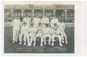 The Ashes. England v Australia 1902. First Test match played at Edgbaston. Early sepia real photograph postcard of the England team seated and standing in rows wearing cricket attire and caps, the Edgbaston pavilion in the background. Printed title &lsquo;Engli