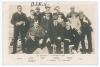 &lsquo;The England XI in Australia 1904&rsquo;. Early sepia real photograph postcard of the England team on board ship, with title and players names printed to lower border. Signed in black ink to the front by A.E. Relf, and to verso by Tom Hayward. Others featured i