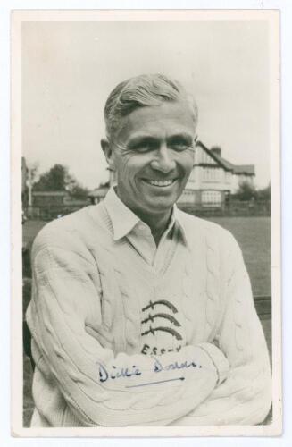 Thomas Carter &lsquo;Dickie&rsquo; Dodds. Essex 1946-1959. Mono real photograph postcard of Dodds, half length wearing Essex sweater and cricket attire. Signed in ink to the photograph &lsquo;Dickie Dodds&rsquo;. Publisher unknown. Postally unused. Very good condition.
