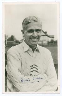 Thomas Carter &lsquo;Dickie&rsquo; Dodds. Essex 1946-1959. Mono real photograph postcard of Dodds, half length wearing Essex sweater and cricket attire. Signed in ink to the photograph &lsquo;Dickie Dodds&rsquo;. Publisher unknown. Postally unused. Very good condition.