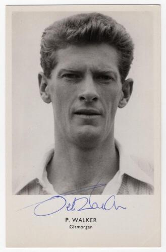 Peter Michael Walker. Glamorgan & England 1956-1972. Mono real photograph postcard of Walker, head and shoulders wearing cricket attire. Nicely signed in blue biro to the photograph &lsquo;Peter Walker&rsquo;. Sporting Handbooks Ltd., London. Postally unused. Minor m