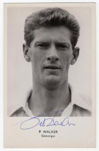 Peter Michael Walker. Glamorgan & England 1956-1972. Mono real photograph postcard of Walker, head and shoulders wearing cricket attire. Nicely signed in blue biro to the photograph &lsquo;Peter Walker&rsquo;. Sporting Handbooks Ltd., London. Postally unused. Minor m
