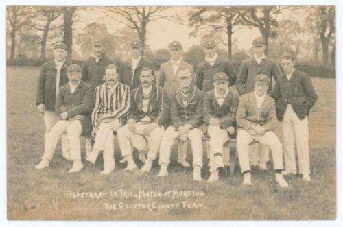Gloucestershire C.C.C. c.1907. Early sepia real photograph postcard of the Gloucestershire team seated and standing in rows wearing assorted blazers and caps. Title to lower edge &lsquo;Gloucestershire [sic] Trial Match at Moreton. The Gloucester [sic] County T