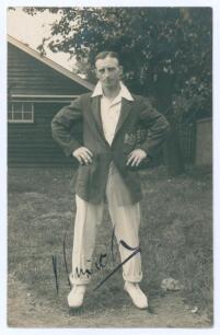 Harry Smith. Gloucestershire & England 1912-1935. Original mono real photograph postcard of Smith standing full length wearing cricket attire and Gloucestershire blazer, hands on hips. Signed in ink by Smith. Blind embossed stamp for Nias of Brighton to l