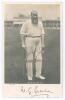 William Gilbert Grace. Gloucestershire & England 1865-1908. Rare and early mono real photograph postcard of Grace standing full length on the outfield at Trent Bridge, wearing batting attire and M.C.C. hooped cap, leaning on his bat. Very nicely signed in