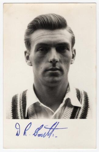 David Robert Smith. Gloucestershire & England 1956-1970. Mono real photograph plain back postcard of Smith, head and shoulders wearing cricket attire. Nicely signed in blue ink to the lower margin &lsquo;D.R. Smith&rsquo;. Publisher unknown. Postally unused. Very goo
