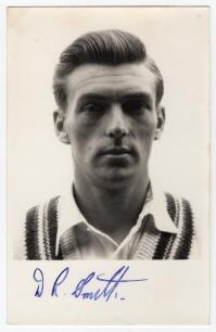 David Robert Smith. Gloucestershire & England 1956-1970. Mono real photograph plain back postcard of Smith, head and shoulders wearing cricket attire. Nicely signed in blue ink to the lower margin &lsquo;D.R. Smith&rsquo;. Publisher unknown. Postally unused. Very goo