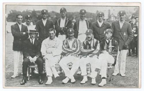 Hampshire C.C.C. 1912. Early original mono postcard of the Hampshire team that beat the touring Australians at Southampton, 22nd- 24th July 1912, the players seated and standing in rows wearing cricket attire, blazers and caps, spectators in the backgroun
