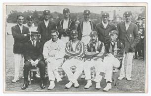 Hampshire C.C.C. 1912. Early original mono postcard of the Hampshire team that beat the touring Australians at Southampton, 22nd- 24th July 1912, the players seated and standing in rows wearing cricket attire, blazers and caps, spectators in the backgroun